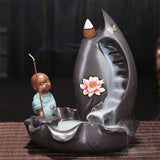 porte encens bouddha cascade